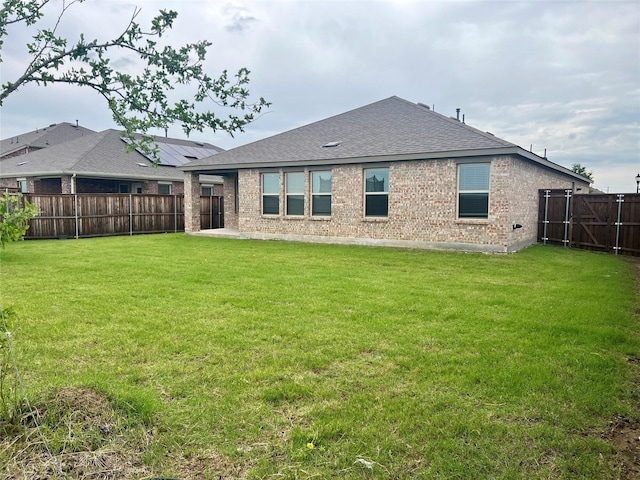 6413 Tudor Pl, Celina, TX 76227 - back of property with brick siding and a shingled roof