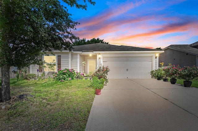 1445 Macy Ln, Dallas, TX 75253 - ranch-style home with driveway, an attached garage, and a yard