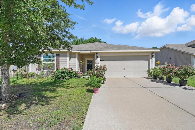 1445 Macy Ln, Dallas, TX 75253 - single story home with an attached garage, concrete driveway, and a front lawn