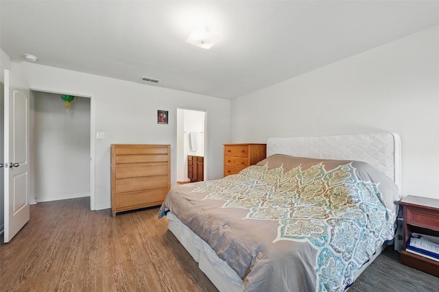1445 Macy Ln, Dallas, TX 75253 - bedroom featuring wood finished floors and baseboards
