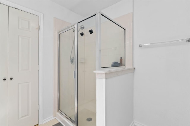4100 Creekhollow Dr, Carrollton, TX 75010 - bathroom with a shower stall and baseboards