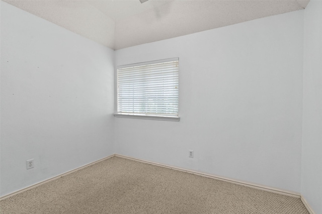 4100 Creekhollow Dr, Carrollton, TX 75010 - spare room with carpet floors and baseboards