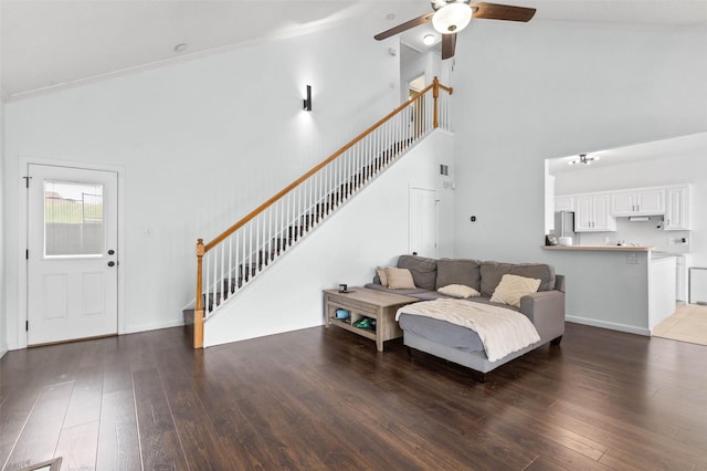 4100 Creekhollow Dr, Carrollton, TX 75010 - living area with stairs, ceiling fan, a high ceiling, hardwood / wood-style flooring, and ornamental molding