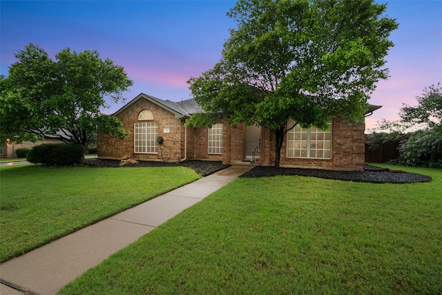 1711 Sage Dr, Midlothian, TX 76065 - view of front of house with a lawn and brick siding