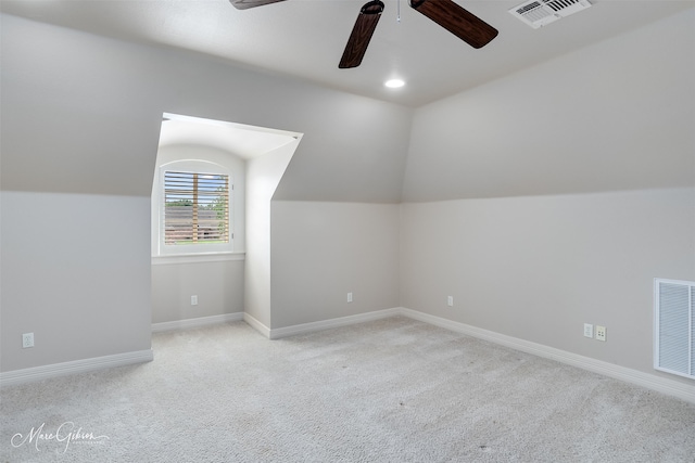 145 Carondelet Ct, Bossier City, LA 71111 - additional living space featuring ceiling fan, light colored carpet, lofted ceiling, and baseboards