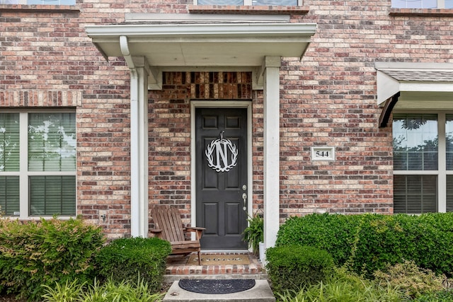 544 S Greenville Ave, Richardson, TX 75081 - doorway to property with brick siding