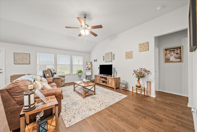609 Autumn Ave, Justin, TX 76247 - living area with ceiling fan, vaulted ceiling, wood finished floors, and baseboards
