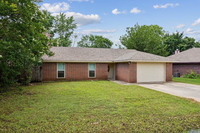 315 Oakwood Cir, Shady Shores, TX 76208 - ranch-style house with an attached garage, central AC unit, concrete driveway, brick siding, and roof with shingles