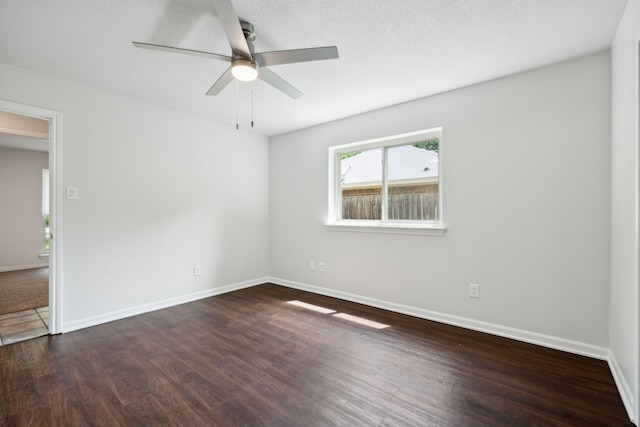 315 Oakwood Cir, Shady Shores, TX 76208 - empty room with a ceiling fan, wood finished floors, and baseboards