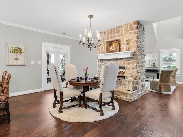 411 Jordan Farm Cir, Rockwall, TX 75087 - dining space featuring wood finished floors, a chandelier, baseboards, and ornamental molding