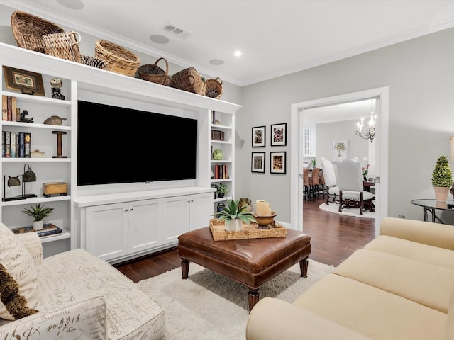 411 Jordan Farm Cir, Rockwall, TX 75087 - living room featuring crown molding, dark wood-style floors, a chandelier, recessed lighting, and built in features