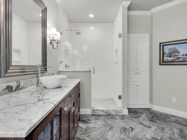 411 Jordan Farm Cir, Rockwall, TX 75087 - full bathroom featuring a stall shower, vanity, baseboards, and crown molding