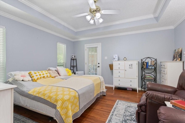 108 Neely Rd, Hewitt, TX 76643 - bedroom with wood finished floors, ornamental molding, a tray ceiling, access to outside, and a ceiling fan