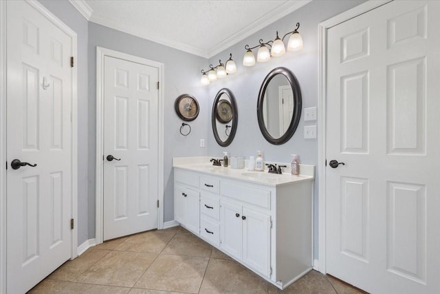 108 Neely Rd, Hewitt, TX 76643 - full bath featuring double vanity, crown molding, tile patterned flooring, baseboards, and a textured ceiling