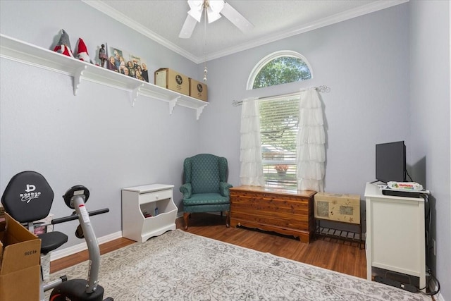 108 Neely Rd, Hewitt, TX 76643 - living area featuring wood finished floors, ornamental molding, ceiling fan, and a desk