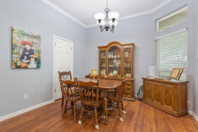 108 Neely Rd, Hewitt, TX 76643 - dining room featuring a chandelier, wood finished floors, crown molding, and baseboards