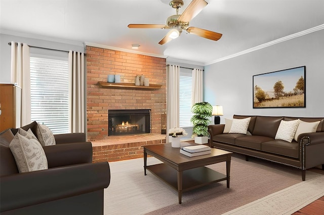 108 Neely Rd, Hewitt, TX 76643 - living room featuring ornamental molding, a ceiling fan, a fireplace, and wood finished floors