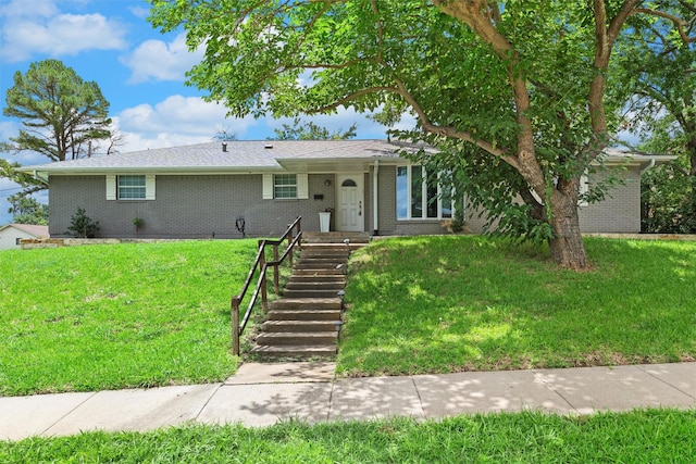 3806 Rainier St, Irving, TX 75062 - ranch-style house with brick siding and a front lawn