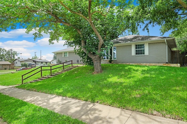 3806 Rainier St, Irving, TX 75062 - single story home featuring brick siding and a front yard