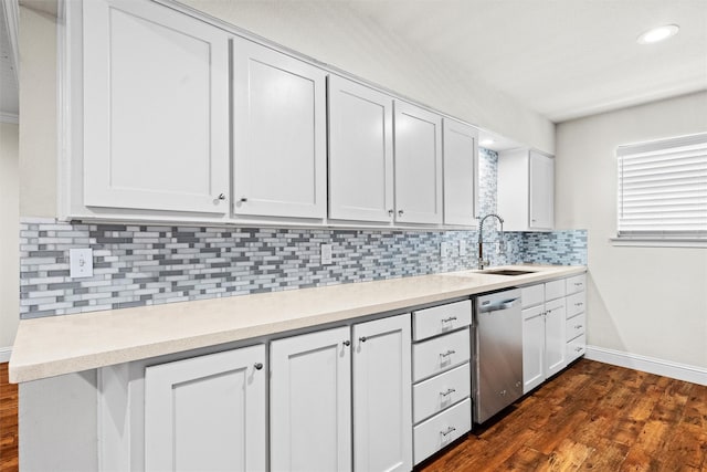 3806 Rainier St, Irving, TX 75062 - kitchen featuring stainless steel dishwasher, a sink, light countertops, white cabinetry, and recessed lighting