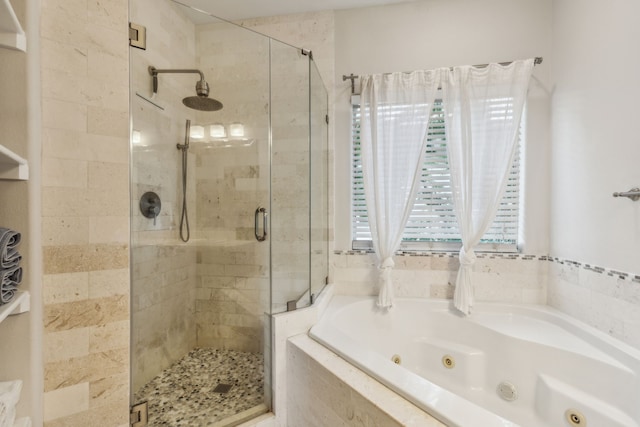 2022 N Fitzhugh Ave Unit E, Dallas, TX 75204 - bathroom with a shower stall and a tub with jets