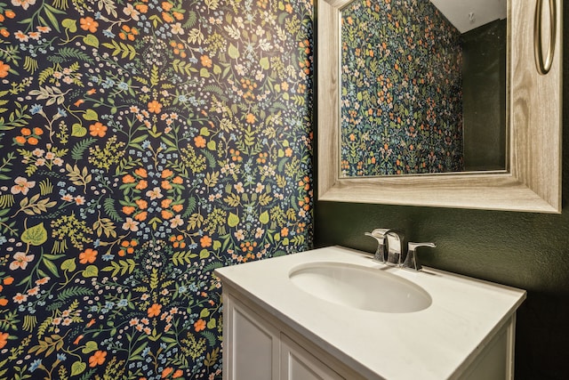 2022 N Fitzhugh Ave Unit E, Dallas, TX 75204 - bathroom featuring vanity and wallpapered walls