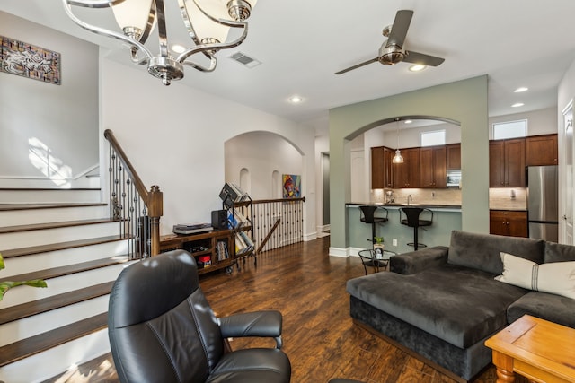2022 N Fitzhugh Ave Unit E, Dallas, TX 75204 - living room with arched walkways, a chandelier, dark wood-style flooring, recessed lighting, and ceiling fan