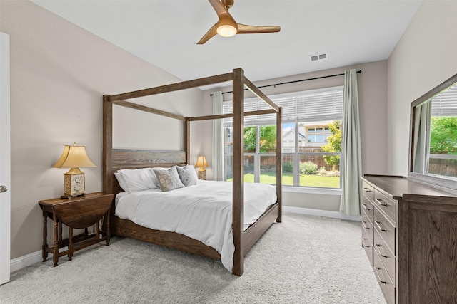 945 Colby Bluff Dr, Rockwall, TX 75087 - bedroom featuring baseboards, light carpet, and a ceiling fan