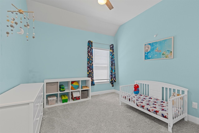 945 Colby Bluff Dr, Rockwall, TX 75087 - carpeted bedroom featuring a crib, baseboards, ceiling fan, and vaulted ceiling