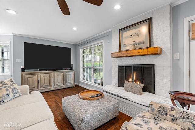 301 Galway Dr, Shreveport, LA 71115 - living room with ornamental molding, a ceiling fan, a fireplace, dark wood-style flooring, and recessed lighting