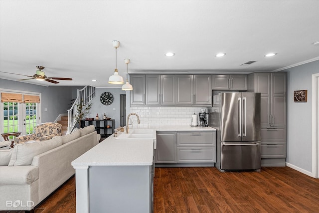 301 Galway Dr, Shreveport, LA 71115 - kitchen with freestanding refrigerator, gray cabinets, a sink, open floor plan, and ceiling fan