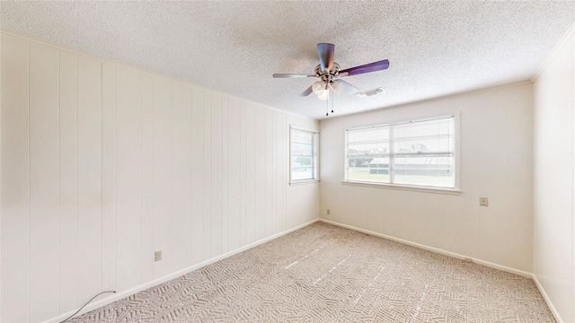 10335 Nolan Dr, Tyler, TX 75709 - unfurnished room featuring a ceiling fan, a textured ceiling, light colored carpet, and baseboards