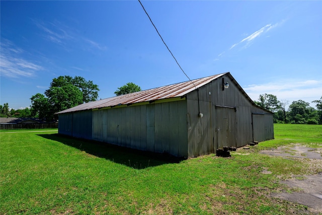 10335 Nolan Dr, Tyler, TX 75709 - view of pole building featuring a lawn