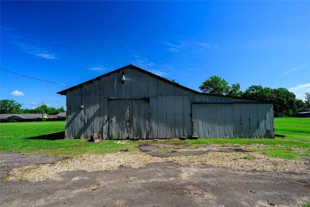 10335 Nolan Dr, Tyler, TX 75709 - view of pole building featuring a lawn
