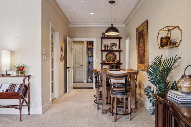 2590 King Arthur Blvd, Lewisville, TX 75056 - dining area featuring light colored carpet, crown molding, and baseboards