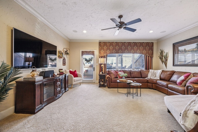 2590 King Arthur Blvd, Lewisville, TX 75056 - living area featuring light colored carpet, ornamental molding, ceiling fan, and recessed lighting