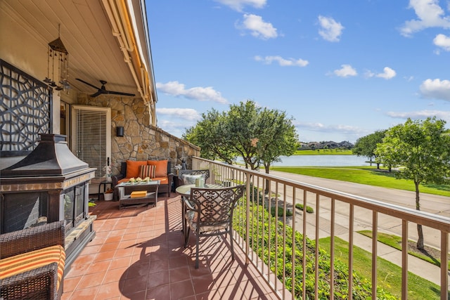 2590 King Arthur Blvd, Lewisville, TX 75056 - balcony with a water view, a ceiling fan, and outdoor lounge area
