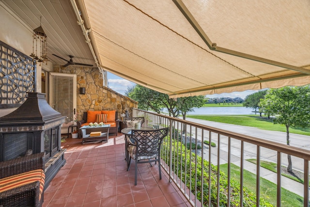 2590 King Arthur Blvd, Lewisville, TX 75056 - view of patio / terrace with a water view, a ceiling fan, and an outdoor living space