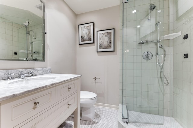 704 Winchester Dr, Richardson, TX 75080 - bathroom with toilet, a stall shower, vanity, and baseboards