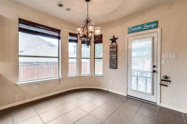 201 Barkley Dr, Hickory Creek, TX 75065 - unfurnished dining area with a chandelier, tile patterned flooring, and baseboards