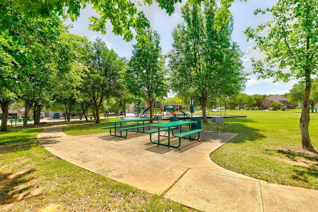 201 Barkley Dr, Hickory Creek, TX 75065 - view of home's community with a lawn