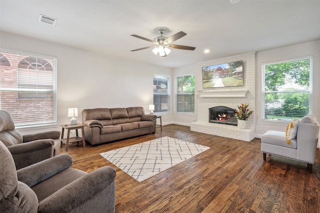 2145 Tartan Trl, Highland Village, TX 75077 - living room with wood finished floors, a ceiling fan, a fireplace, baseboards, and recessed lighting