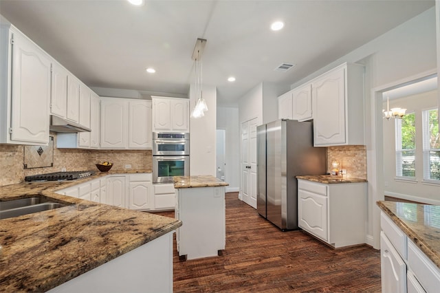 2145 Tartan Trl, Highland Village, TX 75077 - kitchen with stainless steel appliances, stone counters, dark wood-style floors, white cabinetry, and recessed lighting