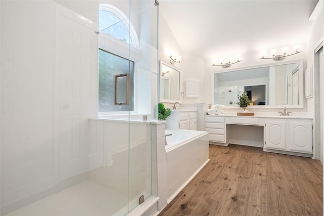 2145 Tartan Trl, Highland Village, TX 75077 - full bath featuring a shower stall, vanity, a bath, and wood finished floors