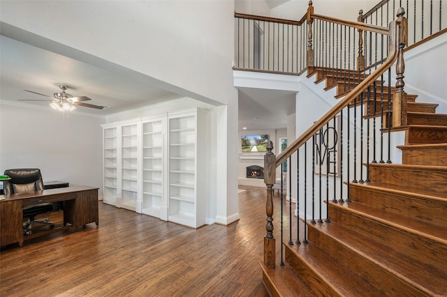 2145 Tartan Trl, Highland Village, TX 75077 - home office with a ceiling fan, wood finished floors, baseboards, and a brick fireplace
