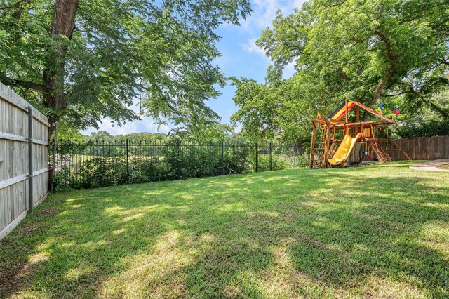 2145 Tartan Trl, Highland Village, TX 75077 - view of yard with a playground