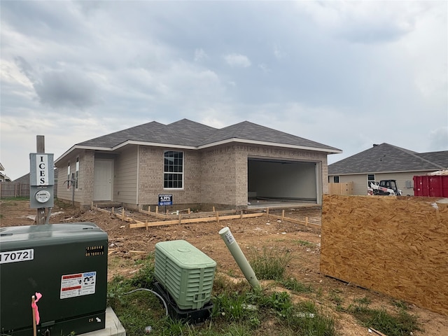 4033 Rimfire Rd, Waco, TX 76705 - view of front of home with brick siding and an attached garage