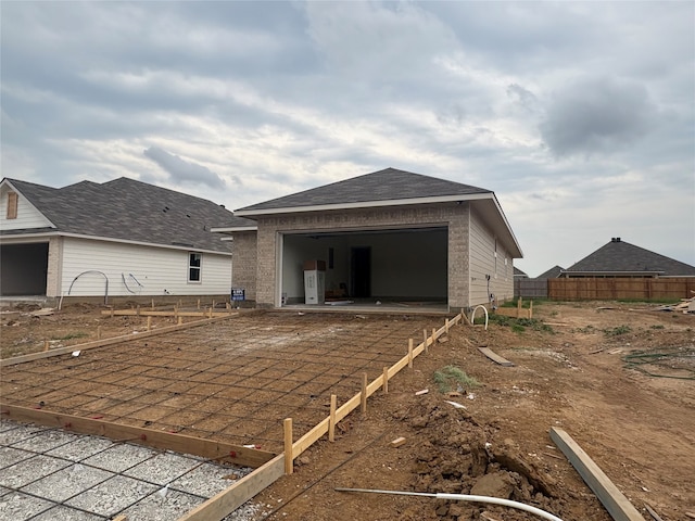 4033 Rimfire Rd, Waco, TX 76705 - view of side of property with brick siding and a garage