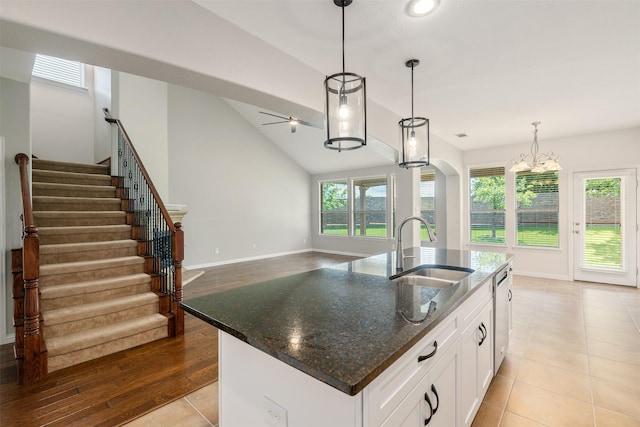 459 Bristol St, Roanoke, TX 76262 - kitchen featuring a sink, healthy amount of natural light, stainless steel dishwasher, decorative light fixtures, and vaulted ceiling