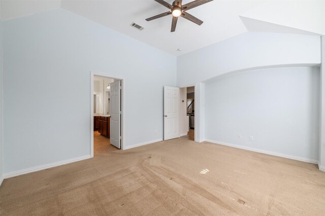 459 Bristol St, Roanoke, TX 76262 - unfurnished bedroom featuring light colored carpet, high vaulted ceiling, ensuite bathroom, baseboards, and ceiling fan